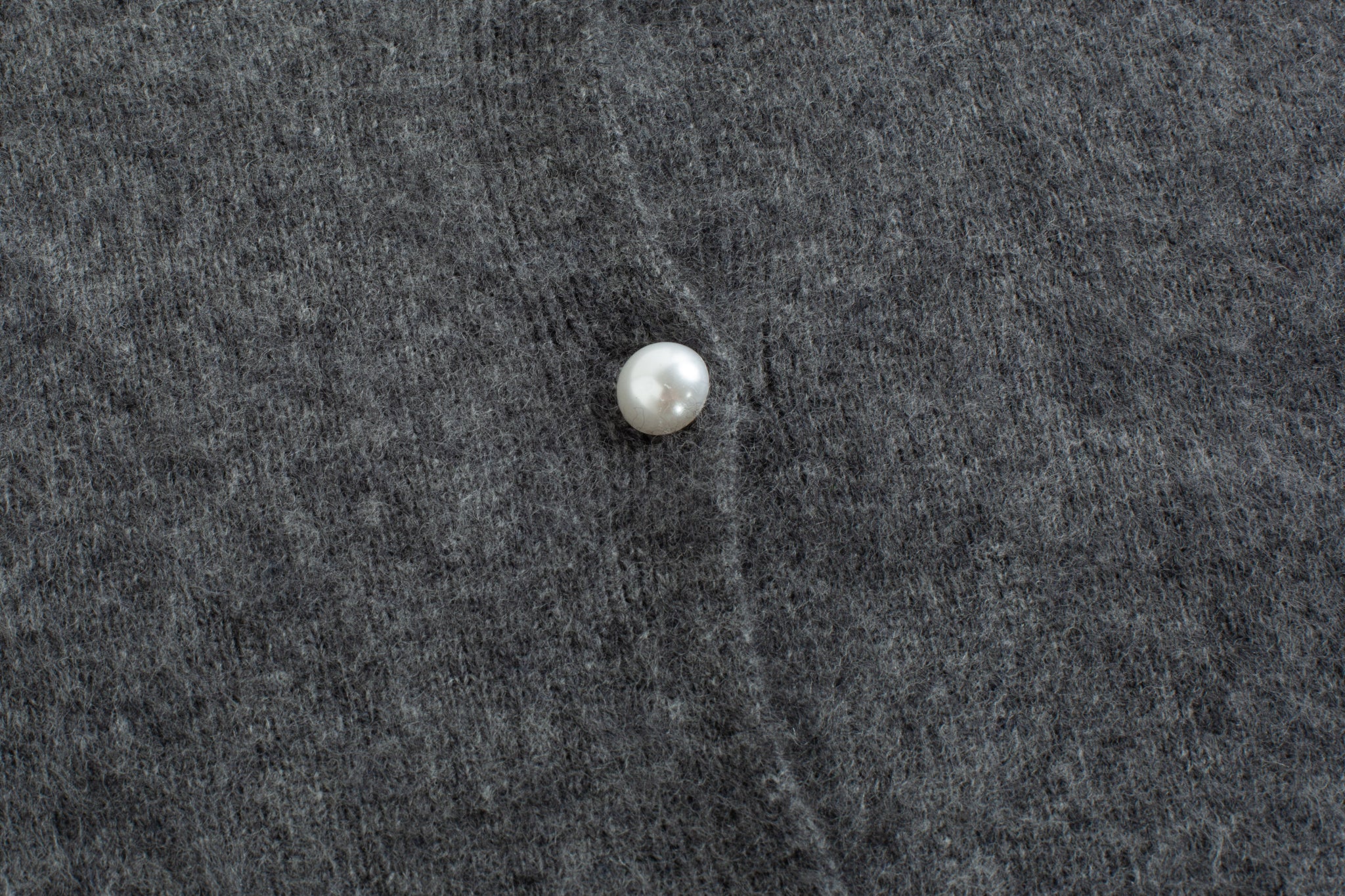 Merra Muse luxe cashmere crew cardigan with a refined, classic silhouette
