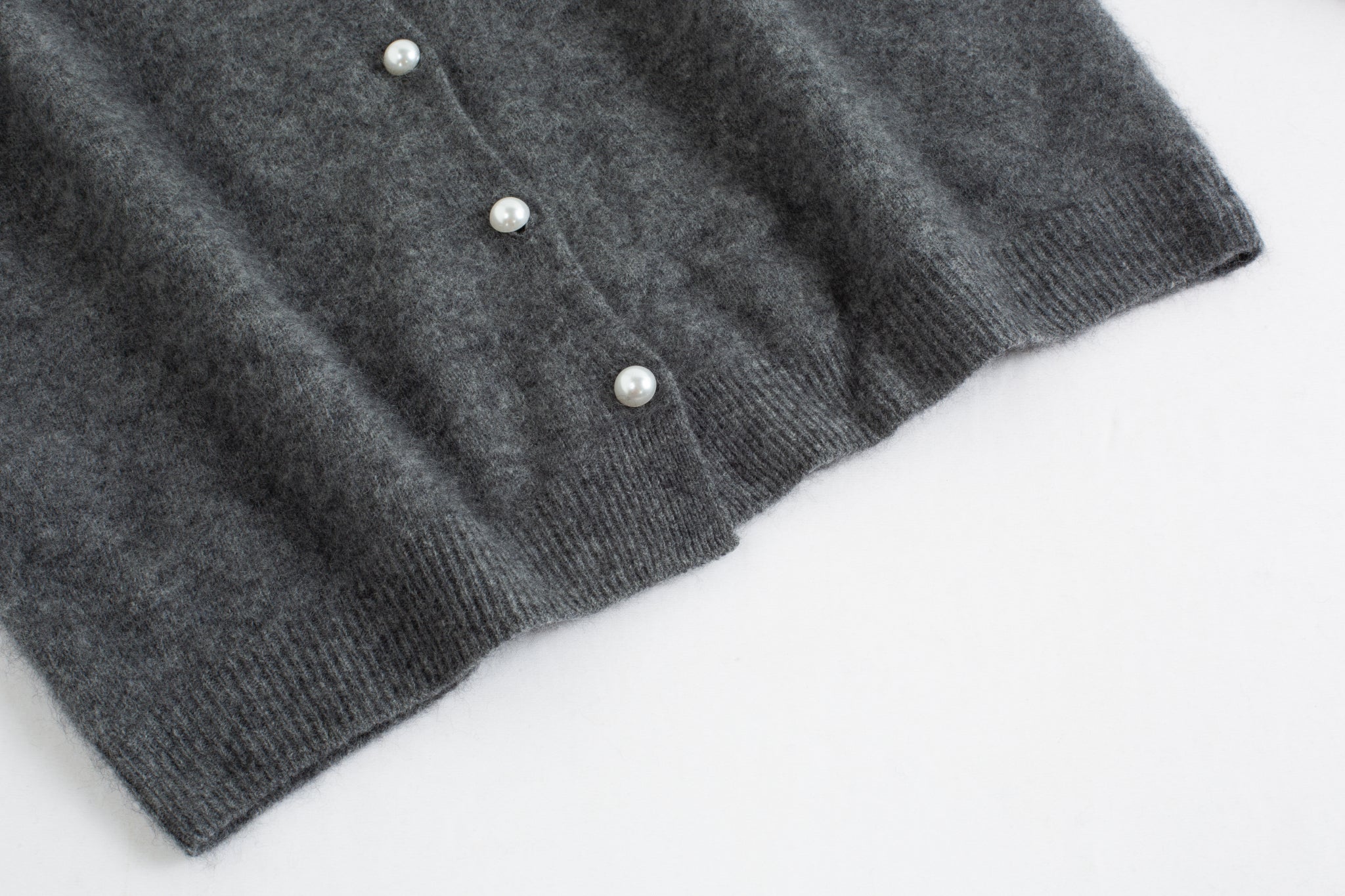 Merra Muse luxe cashmere crew cardigan with a refined, classic silhouette
