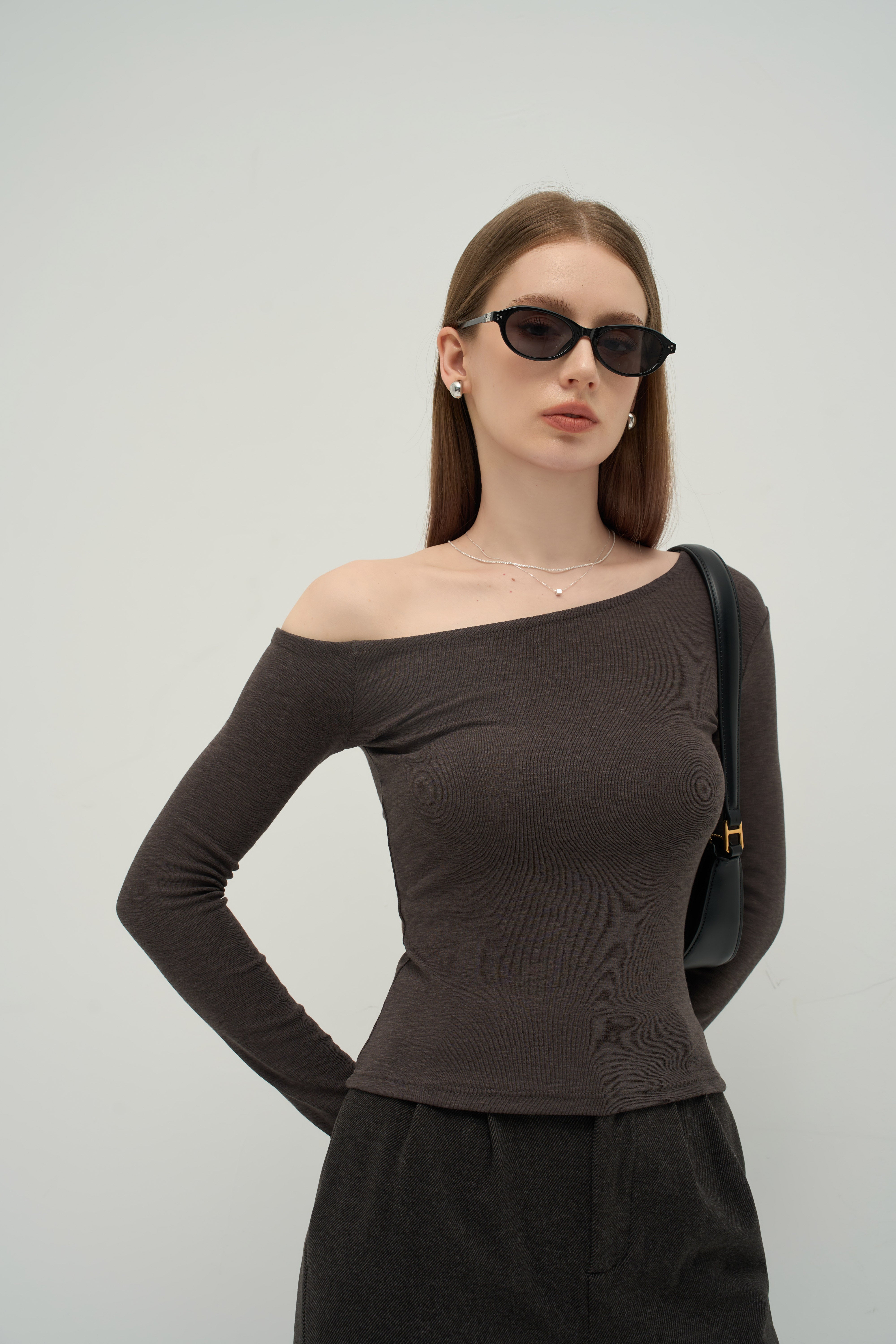 The Sculpted Asymmetrical Off-Shoulder Top