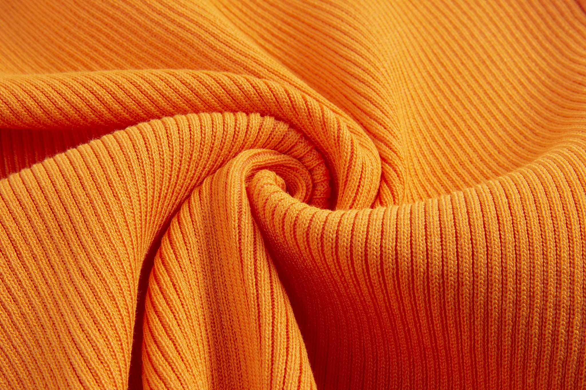 Merra Muse halter V-neck ribbed button tank with a fitted silhouette 
