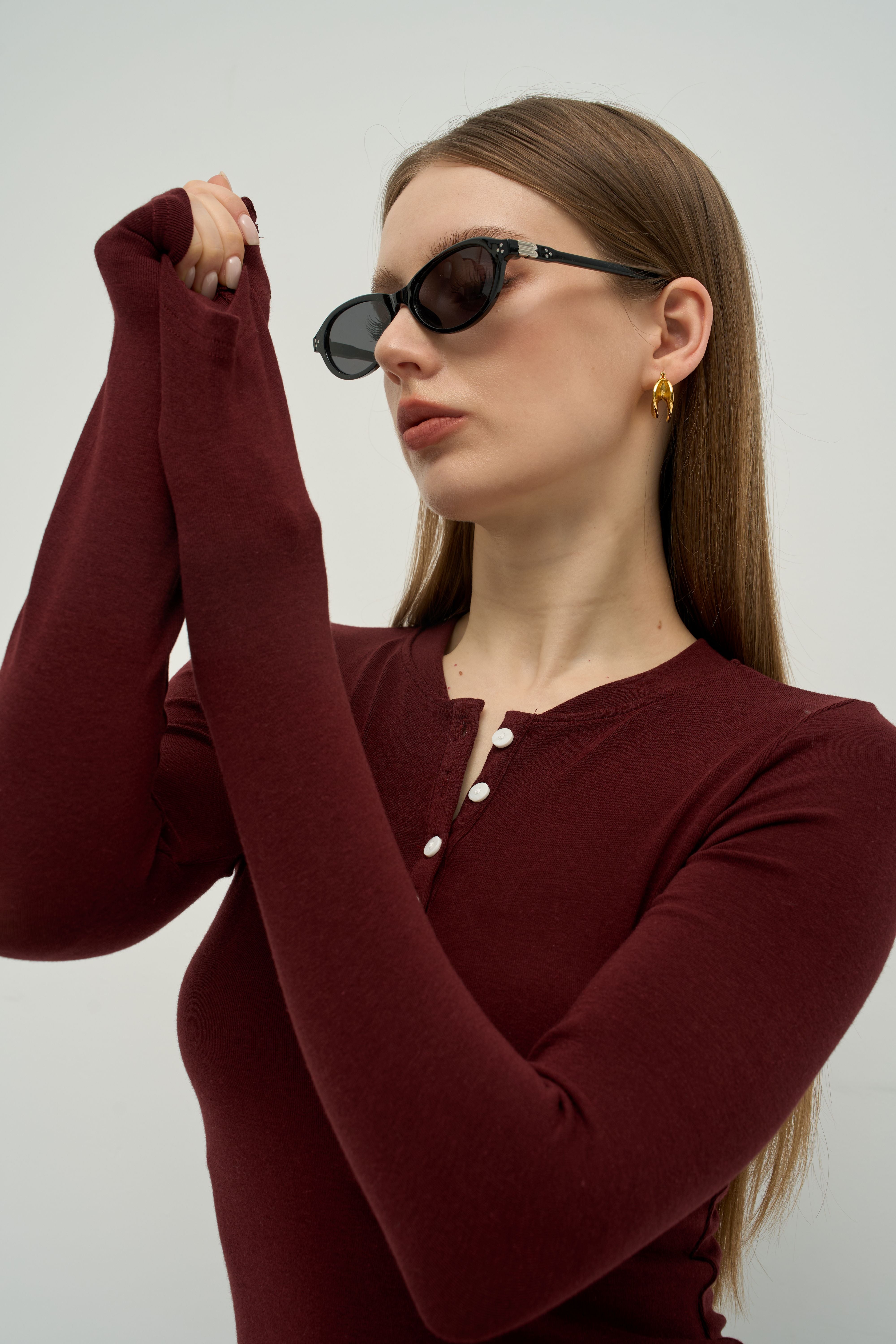 Merra Muse refined cashmere-touch henley long sleeve top with a soft fitted silhouette
